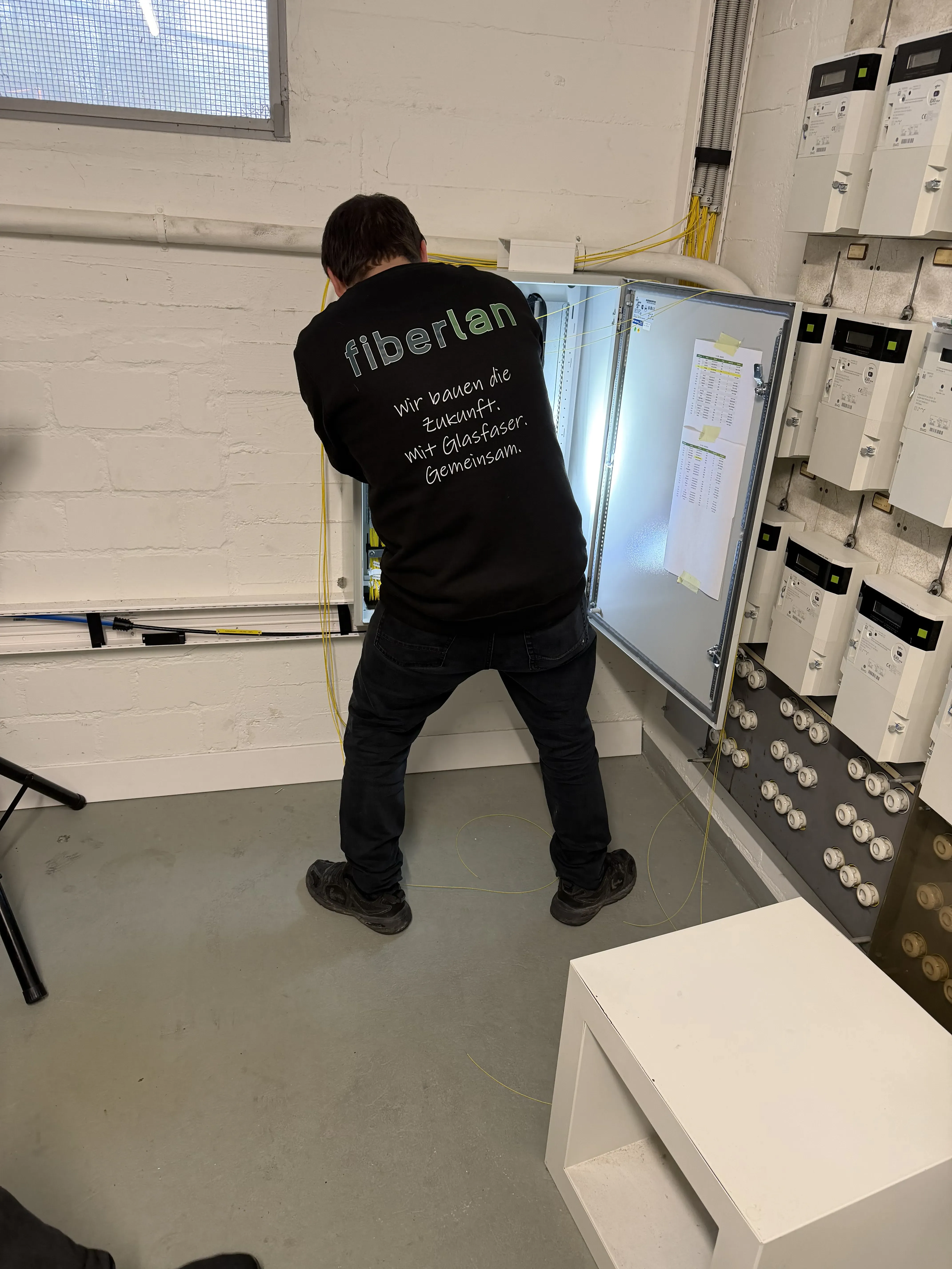fiberlan Techniker im Einsatz – Technicien fibre en action